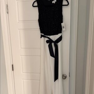 NWT Tahari size 4 women’s Elegant Black lace w sequin and White belted Jumpsuit